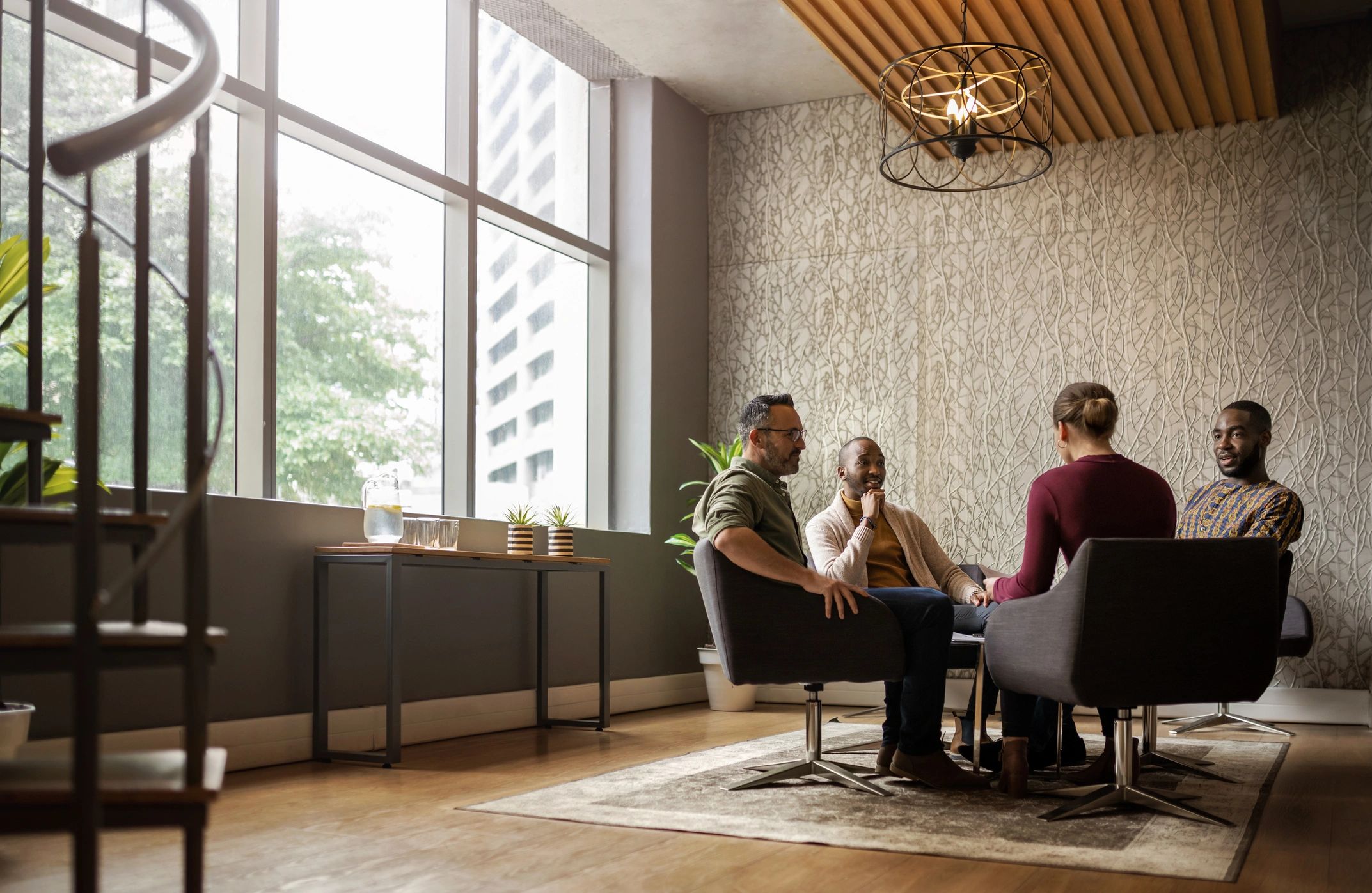 Business meeting in a modern hospitality or service management setting