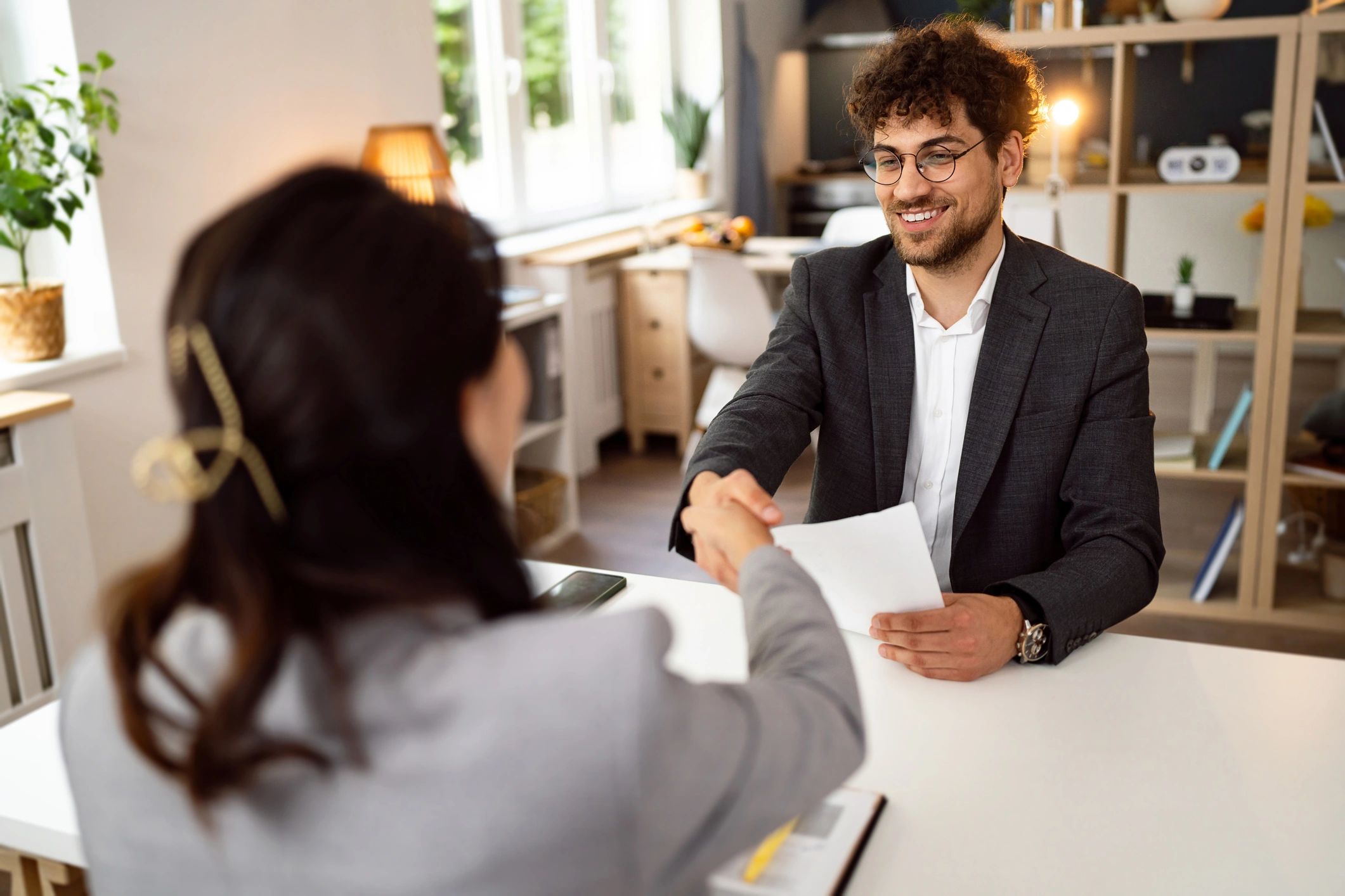 Recruiter greeting a candidate