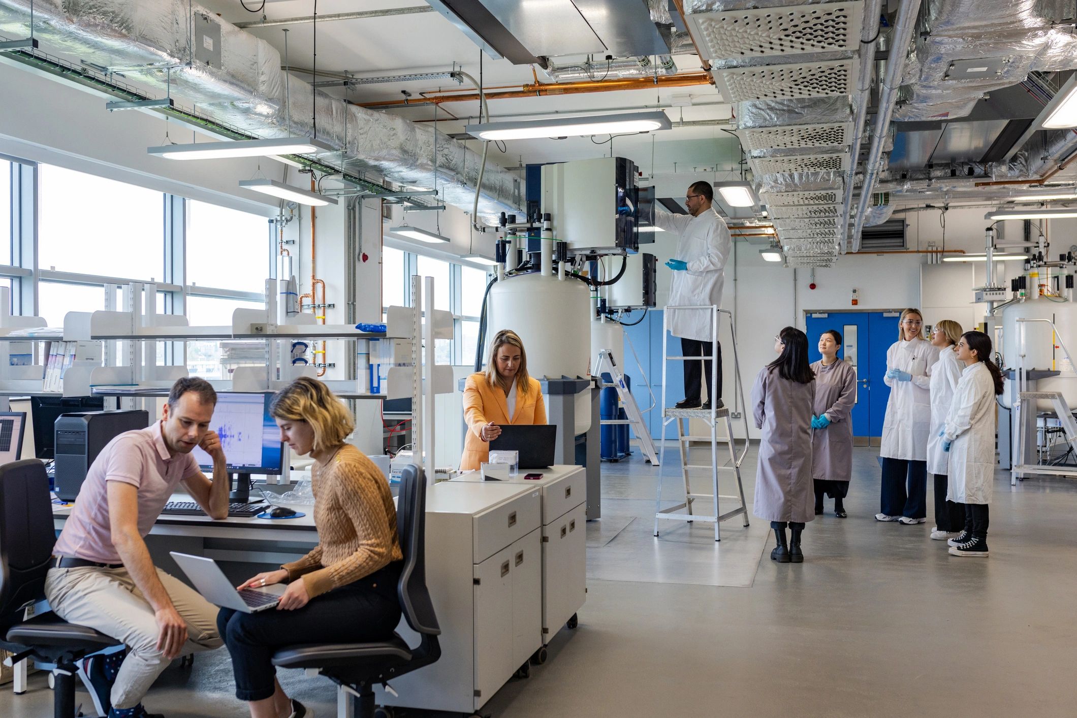 Life sciences team discussing test results in a laboratory