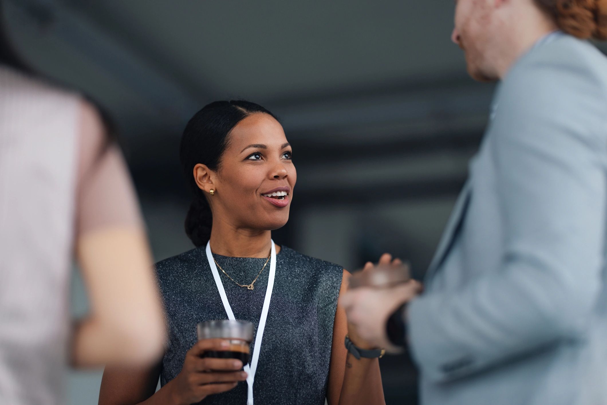 Professional networking conversation at an event