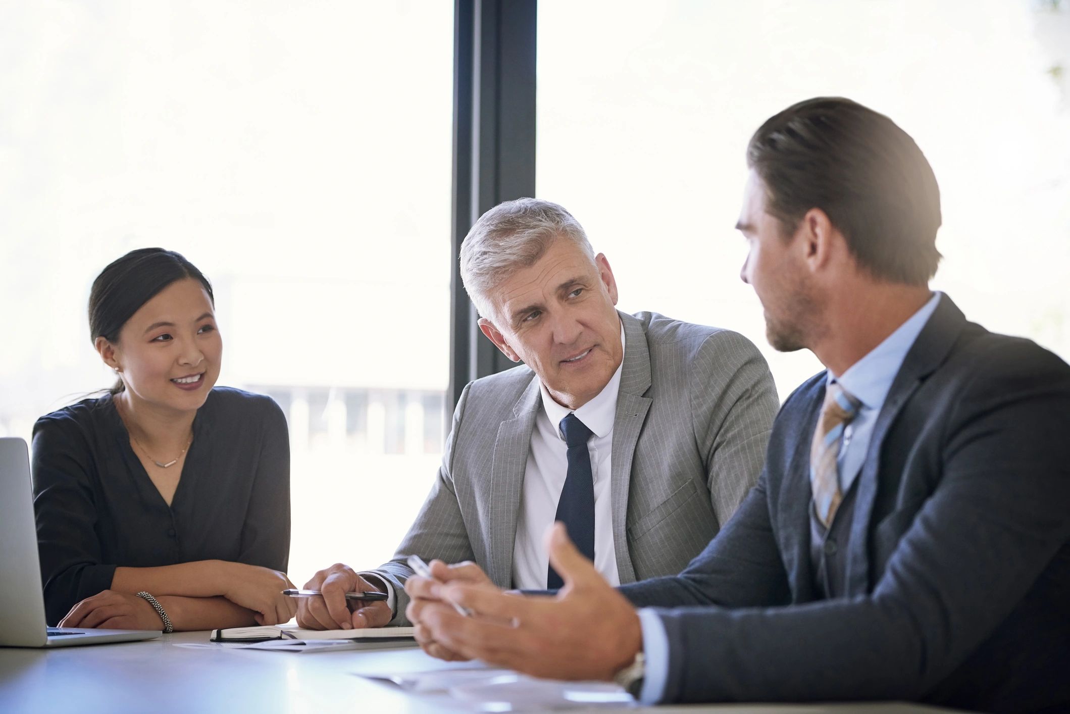Business team meeting around a conference table